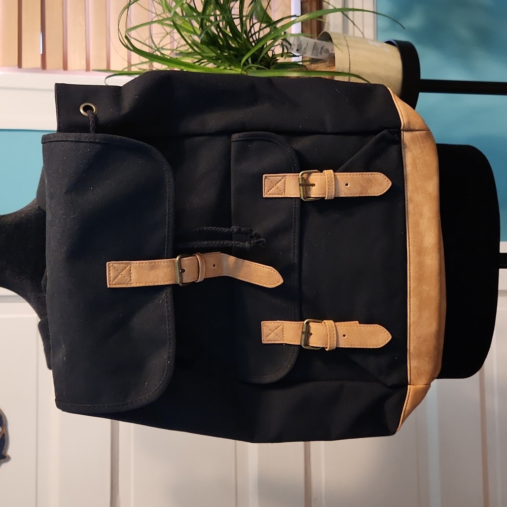 DSW backpack/bag with buckles and drawstring close